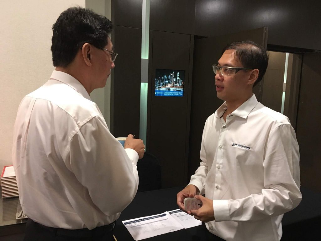 Leading Edge Automation Engineer Song Teck Ng discussing Smarter Buildings with Seminar Attendee